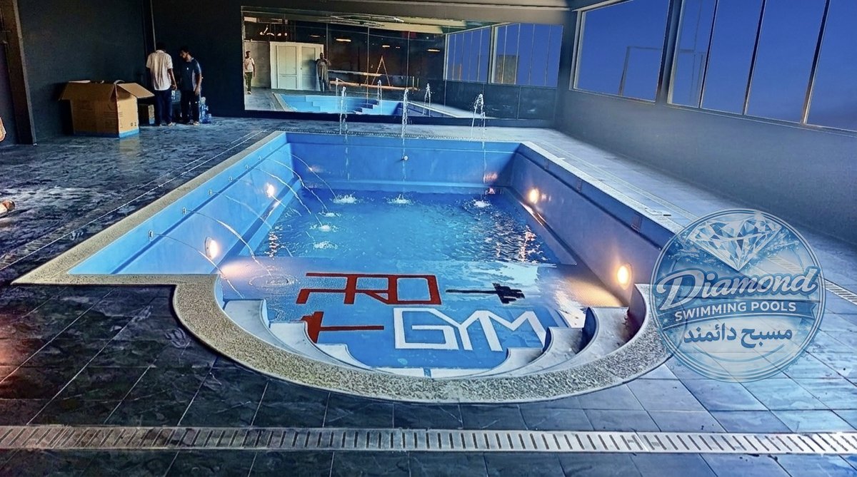 Indoor commercial gym swimming pool with custom logo mosaic
